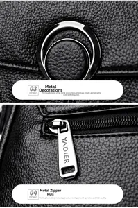 Detail of silver hardware and engraved zipper on black litchi pattern leather bag