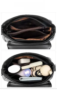 Internal display of the large capacity crossbody bag with compartments for daily items