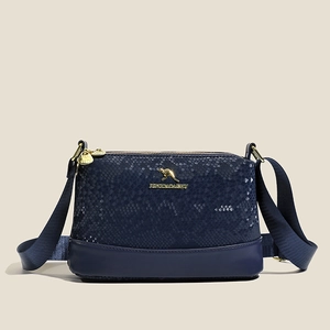 Navy blue Boston handbag with embossed texture and wide shoulder strap