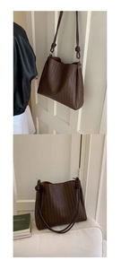 Close-up of a dark brown woven bucket bag featuring detailed craftsmanship and straps