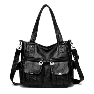 Vintage black soft leather motorcycle tote bag with multiple pockets and shoulder strap