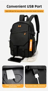 Detail of the side USB charging port on a durable black nylon laptop backpack