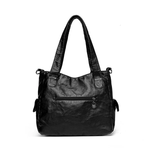 Vintage black faux leather moto tote bag with multiple zippers and wide straps