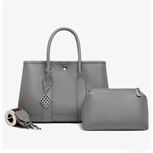Detailed set of grey lychee leather tote bag with inner pouch and wide fabric shoulder strap