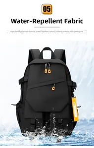 Detailed view of black waterproof backpack showing splash-resistant fabric and orange accents