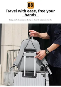 Detailed view of light gray nylon laptop backpack fixed on luggage handle with back strap