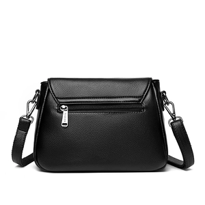 Large capacity black pebbled leather crossbody bag with adjustable strap and back zip pocket