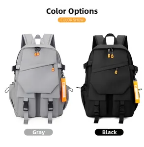 Front view of waterproof nylon techwear backpacks in grey and black with orange zipper tabs