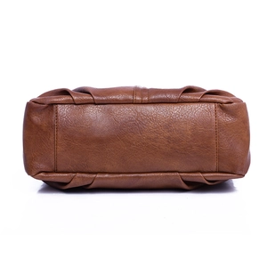 Bottom view of brown PU leather tote bag showing textured surface and stitching details