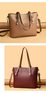 Macro view of lychee-textured leather tote bags showing fine grain and kangaroo logo
