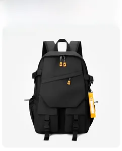 Front view of black versatile backpack featuring orange zipper pulls and side water bottle pocket