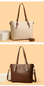 Detailed close-up of litchi grain leather tote bag showing embossed kangaroo logo and texture