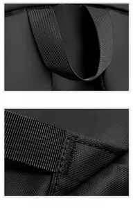 Detail of high-density woven handle and reinforced stitching on black laptop backpack