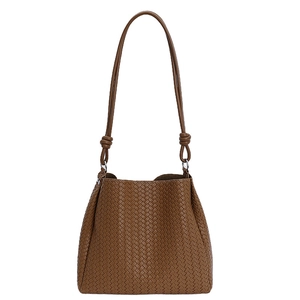 Brown hand-woven leather bucket bag with shoulder strap and large capacity tote design