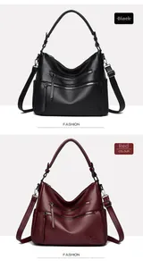 Detail view of lychee texture and multi-zipper design on black and red shoulder bags
