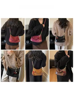 Collage of chic baguette bags in red and brown with chains and cherry charms on models