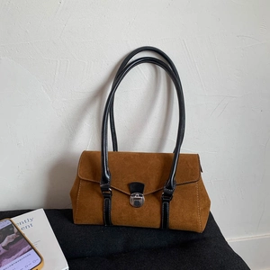 Retro brown suede shoulder bag with silver metal buckle and black leather straps