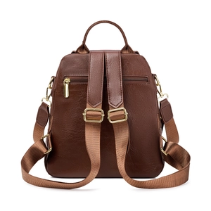 Brown leather anti-theft backpack for women with gold hardware and top handle back view