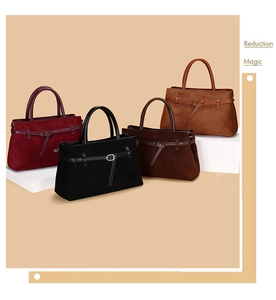 Minimalist matte tote bags in four colors arranged on geometric stands for commuting