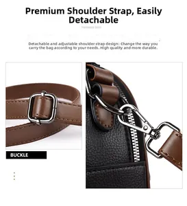 Detail of adjustable leather shoulder strap with durable silver metal hardware buckles