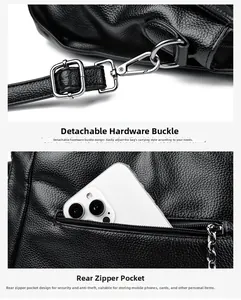 Detail view of black lychee grain leather bag with metal clasp and anti-theft zipper pocket