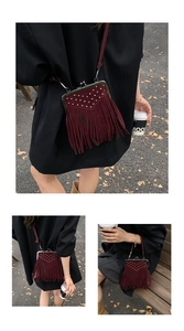 Detail of burgundy fringe crossbody bag with silver rivets and vintage clasp