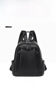 Front view of black pebble leather backpack with chevron quilted stitching and dual zippers