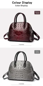 Detail of vintage shell bags in burgundy and grey with embossed crocodile textures