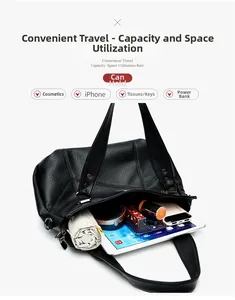 Détail de l'intérieur d'un sac cabas en cuir noir montrant sa grande capacité et ses compartiments
