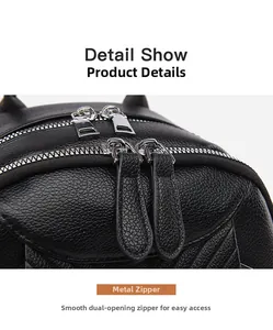 Detail view of durable metal dual zippers on black litchi pattern leather backpack