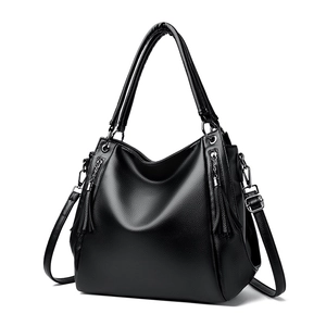 Large black litchi pattern leather tote bag with tassels and adjustable shoulder strap