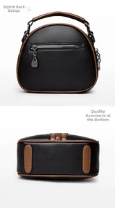 Detail of crossbody bag showing rear zipper pocket and wear-resistant bottom studs