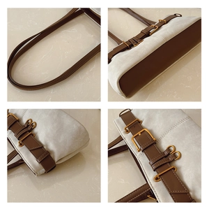 Détail des boucles en cuir marron et des coutures sur le sac à main beige patchwork