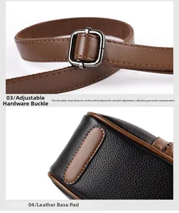 Detail of adjustable metal buckle strap and reinforced leather base on black handbag