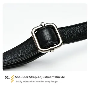 Détail de la bandoulière réglable en cuir PU grainé noir avec boucle rectangulaire argent