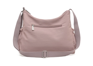 Rear view of light purple nylon crossbody bag showing zip pocket and side compartments
