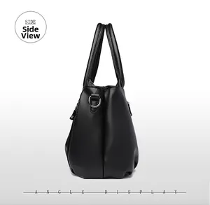 Vue latérale du sac à main en cuir noir grainé avec poignées rondes et détails argentés