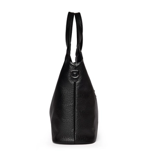 Classic black leather tote bag with lychee texture and silver side D-rings for commuting