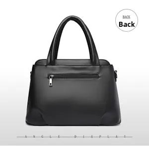 Vue arrière du sac cabas en cuir grainé noir avec une poche extérieure zippée argentée