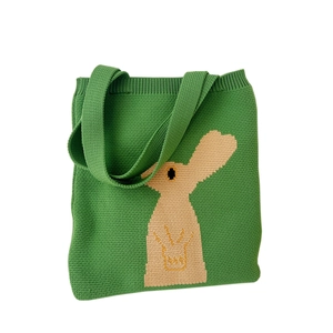 Green knit tote bag with beige rabbit pattern design and long shoulder straps