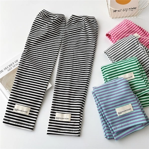 Vertical striped ribbed cotton arm sleeves for women in multiple colors with woven label