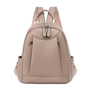 Women's dusty pink backpack in lychee texture leather with V-shaped quilted stitching