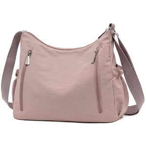 Pink nylon crossbody bag with wide strap and multiple zipper pockets for daily commute