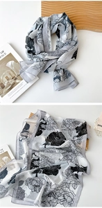Close-up of elegant black and white rose print on lightweight breathable chiffon scarf