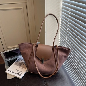 Brown suede and leather tote bag with gold buckle clasp for daily commute