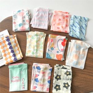 Detail shot of breathable sun protection sleeves with various trendy floral and cartoon patterns