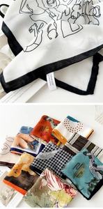 Detailed macro view of floral print cotton-linen scarf with premium velvet texture label