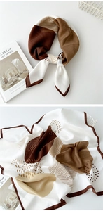 Detailed close-up of a geometric cotton linen square scarf with brown and cream patterns