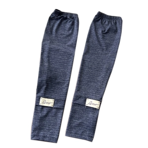Heather gray sun protection arm sleeves with elastic cuffs and decorative brand label