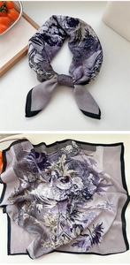 Close-up of vintage floral cotton linen scarf with elegant gray-purple prints and black borders
